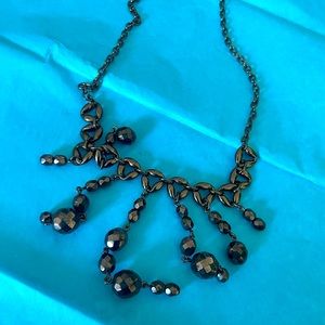 Delightful black beaded necklace.